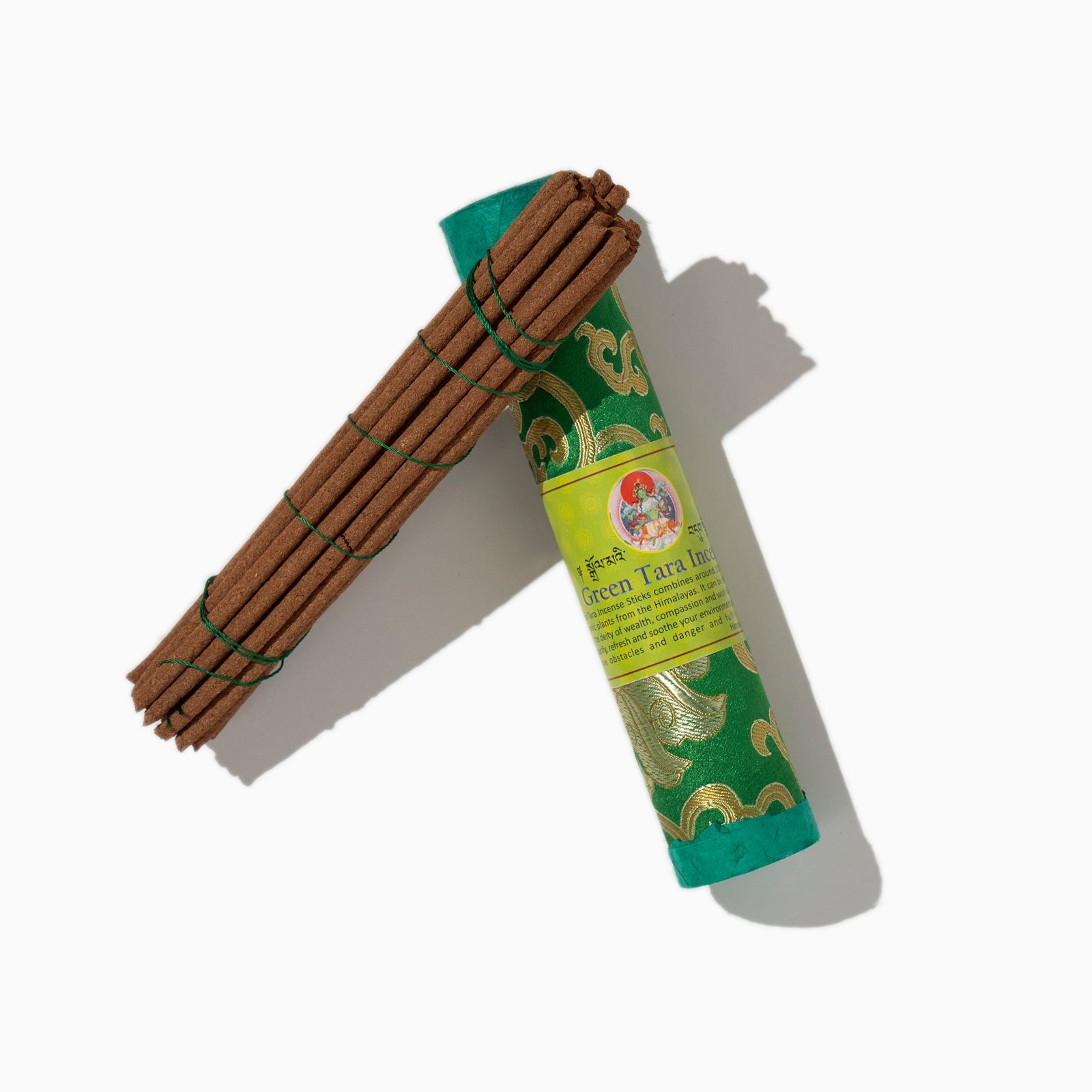 open box of Green Tara Tibetan incense sticks on white background