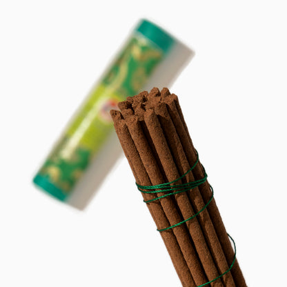 detail of box of Green Tara Tibetan incense sticks on white background