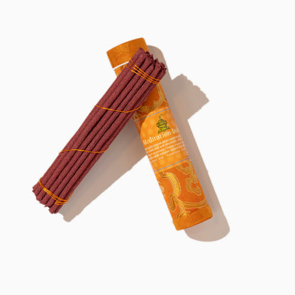 open box of Meditation Tibetan incense sticks on white background