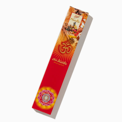 box of Om Shanthi Cycle Indian incense sticks on white background