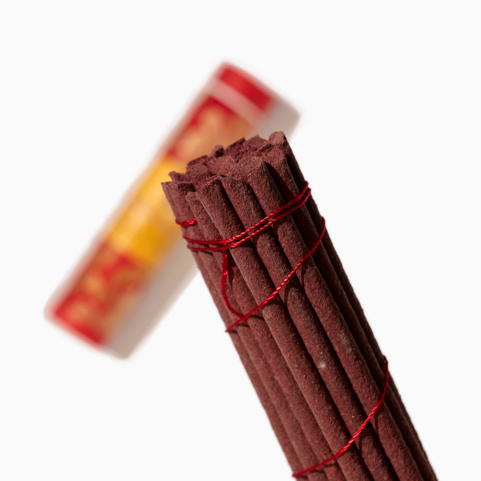 detail box of Padmasambhava Tibetan incense sticks on white background