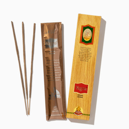 detail of box of Parampara Cycle Indian incense sticks on white background