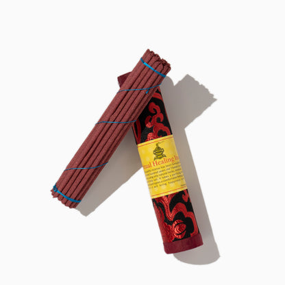 open box of Spiritual Healing Tibetan incense sticks on white background